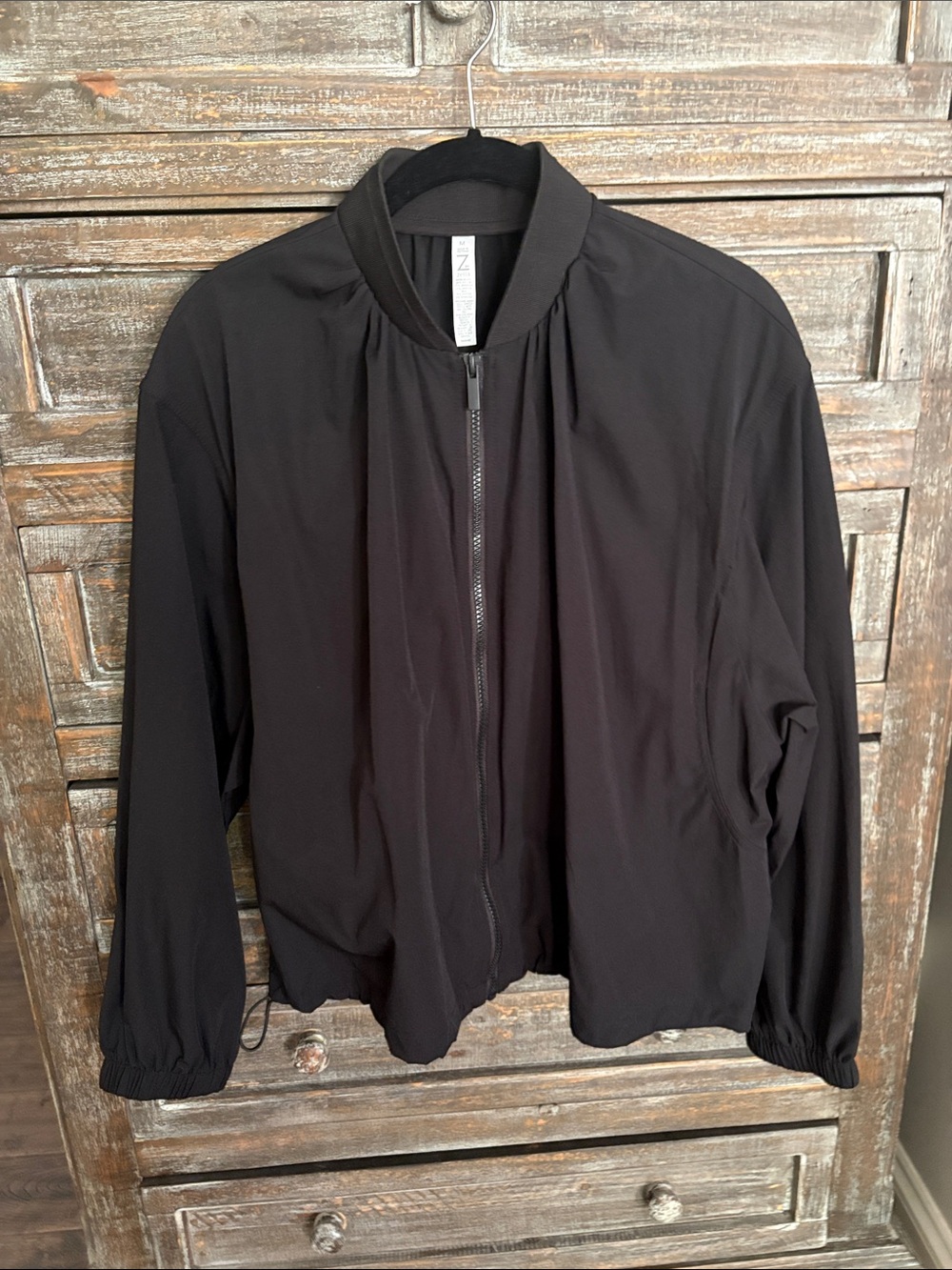 Minimalist Black Bomber Jacket with Zip Front